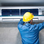 Technician,Man,Repairing,,cleaning,And,Maintenance,Air,Conditioner,On,The