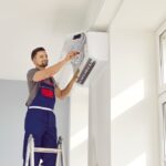 Male,Worker,Fixing,Air,Conditioning,At,Home.,Man,In,Uniform