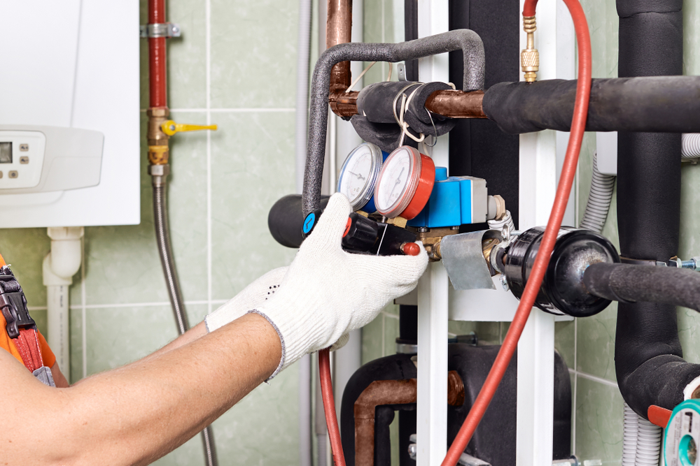 Maintenance,Engineer,Checking,Technical,Data,Of,Heating,System,Equipment,In